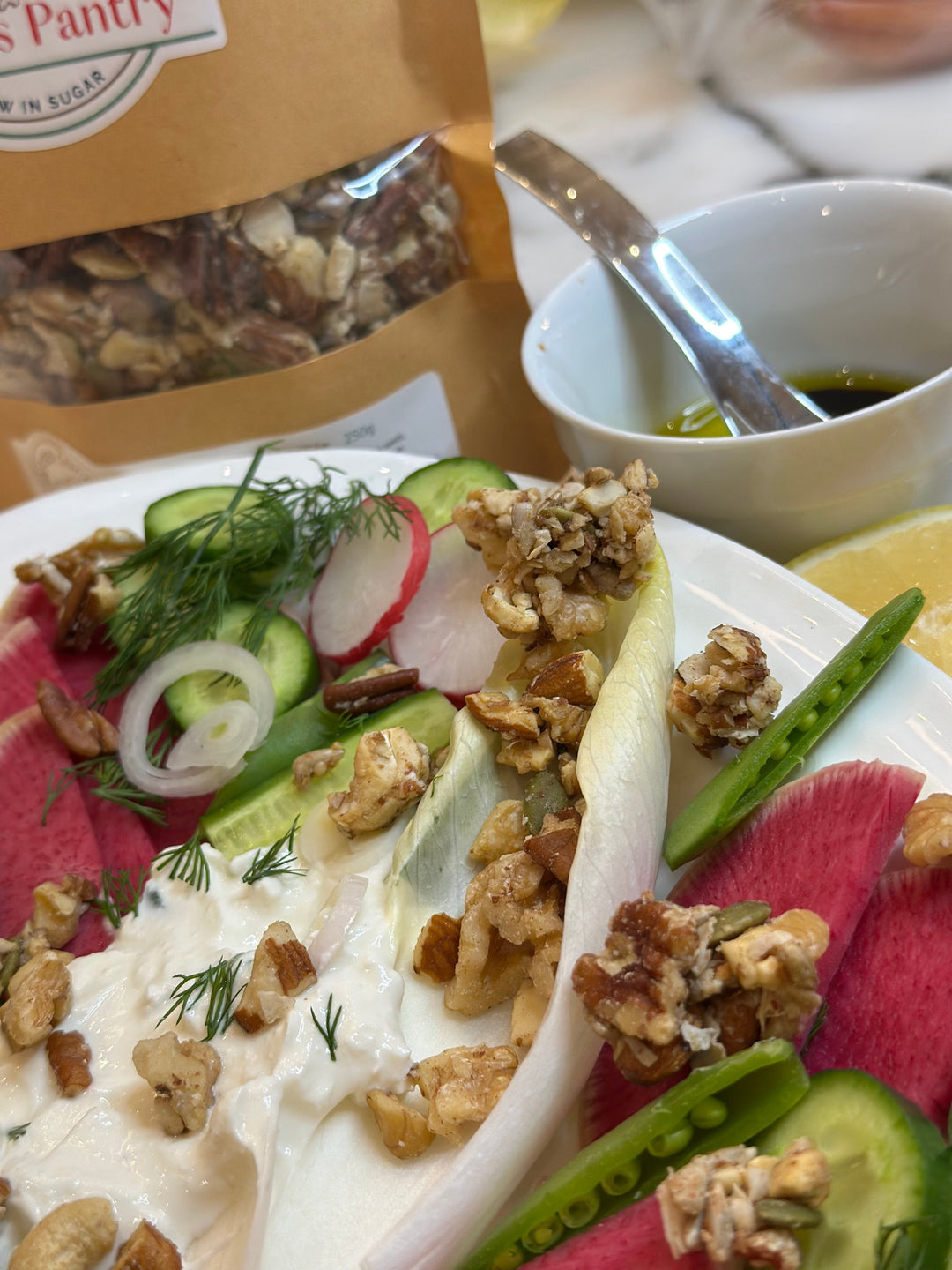 Refreshing Endive Salad with Cucumber, Tzatziki, Dill, Radish, and Granola